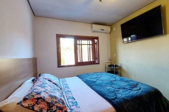 Quarto 1 de casa de condomínio à venda com 4 quartos, 200m² em Partenon, Porto Alegre