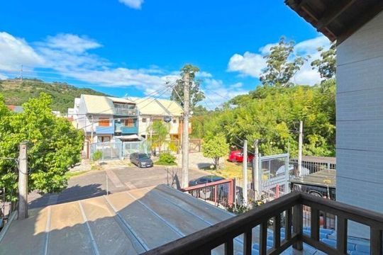 Varanda de casa para alugar com 3 quartos, 129m² em Guarujá, Porto Alegre