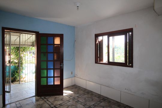 Sala de casa à venda com 4 quartos, 210m² em Mário Quintana, Porto Alegre