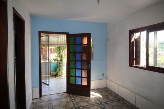Sala de casa à venda com 4 quartos, 210m² em Mário Quintana, Porto Alegre
