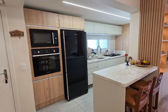 Cozinha de apartamento à venda com 3 quartos, 96m² em Teresópolis, Porto Alegre