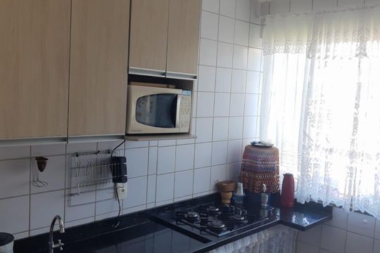 Cozinha de casa de condomínio à venda com 2 quartos, 70m² em Jardim Riacho das Pedras, Contagem