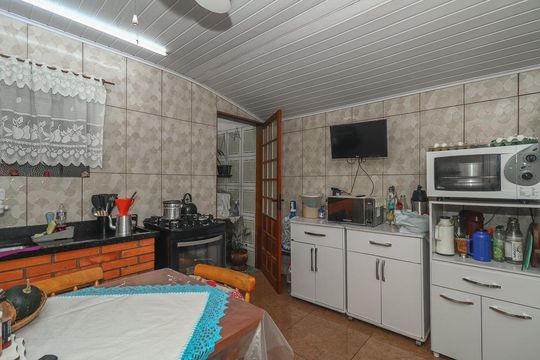 Cozinha de casa à venda com 3 quartos, 160m² em Costa E Silva, Porto Alegre