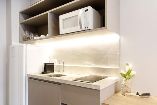 Cozinha de apartamento à venda com 1 quarto, 25m² em Jardim Paulista, São Paulo