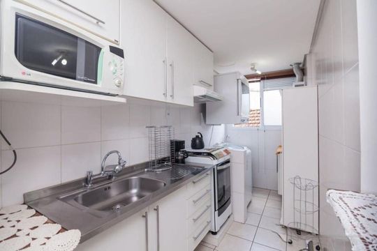 Cozinha  de apartamento para alugar com 2 quartos, 63m² em Santo Antônio, Porto Alegre