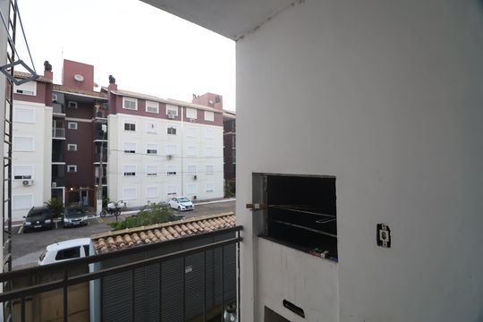 Sacada  churrasqueira  de apartamento à venda com 3 quartos, 64m² em Igara, Canoas