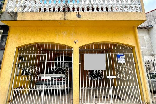 Placa instalada na fachada do imóvel  de casa à venda com 2 quartos, 156m² em Jardim Toscana, Guarulhos