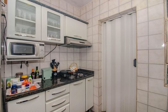 Cozinha e Área de Serviço de apartamento à venda com 2 quartos, 45m² em Santa Rosa de Lima, Porto Alegre