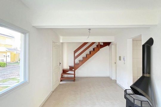 Sala de casa de condomínio para alugar com 3 quartos, 135m² em Hípica, Porto Alegre