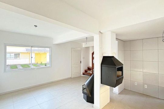 Sala de casa de condomínio para alugar com 3 quartos, 135m² em Hípica, Porto Alegre