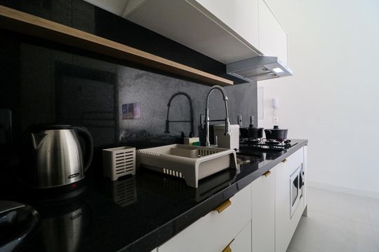 Cozinha de apartamento para alugar com 2 quartos, 74m² em Jurerê, Florianópolis