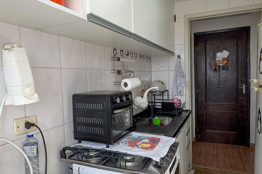 Cozinha e Área de Serviço de apartamento à venda com 2 quartos, 48m² em Jardim Iracema, São Paulo