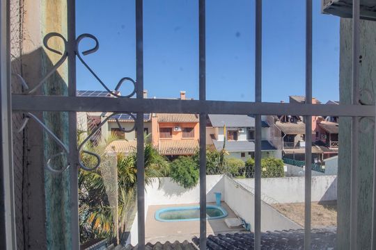 Vista de casa à venda com 4 quartos, 210m² em Guarujá, Porto Alegre