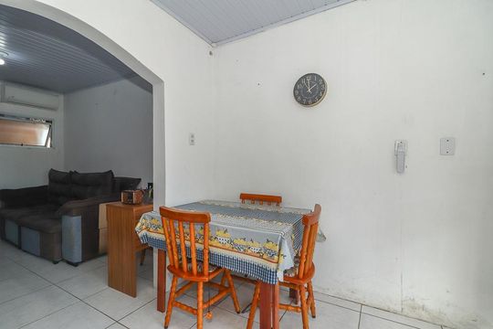 Sala de casa à venda com 5 quartos, 128m² em Farrapos, Porto Alegre