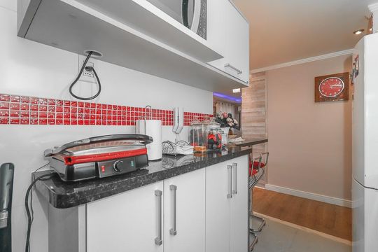 Cozinha de apartamento à venda com 3 quartos, 69m² em Humaitá, Porto Alegre