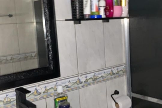 Banheiro de casa à venda com 3 quartos, 130m² em Restinga, Porto Alegre