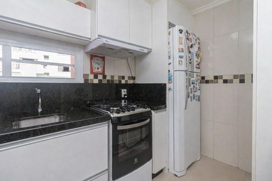 Cozinha de apartamento à venda com 2 quartos, 80m² em Medianeira, Porto Alegre