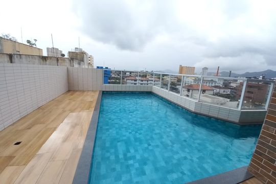 Área comum - Piscina de apartamento para alugar com 2 quartos, 58m² em Parque Bitaru, São Vicente