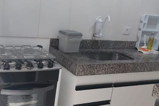 Cozinha de casa de condomínio para alugar com 2 quartos, 64m² em Parque Enseada, Guarujá