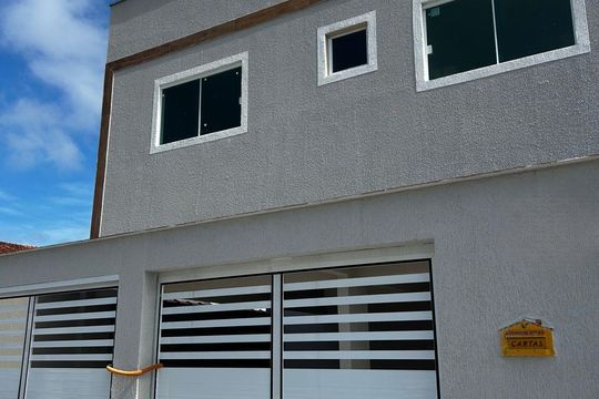 Fachada de casa de condomínio para alugar com 2 quartos, 106m² em Jardim Imperador IV, Praia Grande