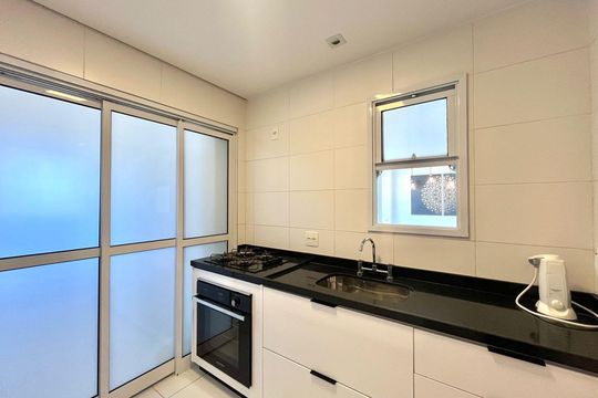 Cozinha de apartamento à venda com 1 quarto, 57m² em Cambuí, Campinas