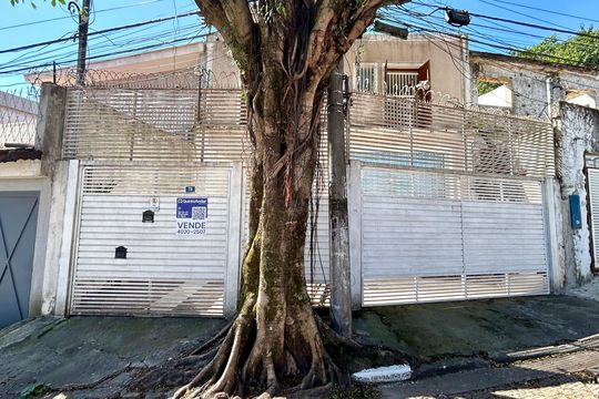 Placa instalada na fachada do imóvel  de casa à venda com 3 quartos, 162m² em Chácara São Luís, Guarulhos