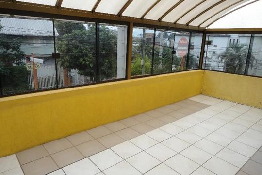 Varanda de casa à venda com 3 quartos, 199m² em Cristo Redentor, Porto Alegre