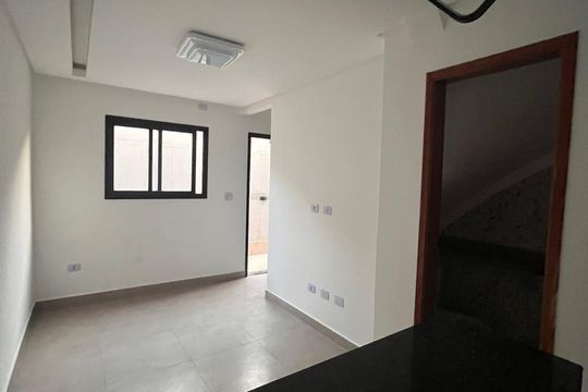 Sala de casa de condomínio para alugar com 2 quartos, 52m² em Vila Caiçara, Praia Grande