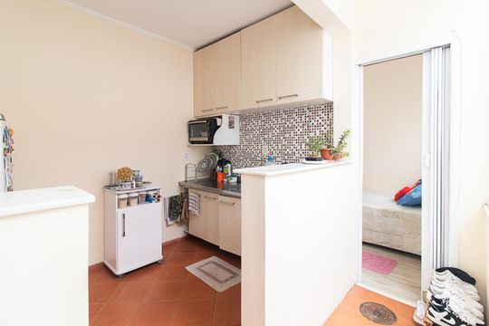 Cozinha e Área de Serviço de apartamento à venda com 3 quartos, 75m² em Azenha, Porto Alegre