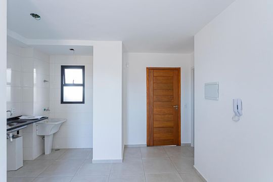 Sala, cozinha e área de serviço de apartamento à venda com 1 quarto, 45m² em Vila Santa Edwiges, São Paulo