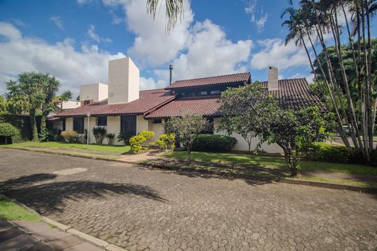 Fachada de casa de condomínio para alugar com 6 quartos, 440m² em Jardim Botânico, Porto Alegre