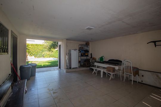 Garagem de casa de condomínio para alugar com 6 quartos, 440m² em Jardim Botânico, Porto Alegre