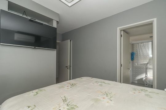 Quarto Suíte de apartamento à venda com 2 quartos, 107m² em Independência, Porto Alegre