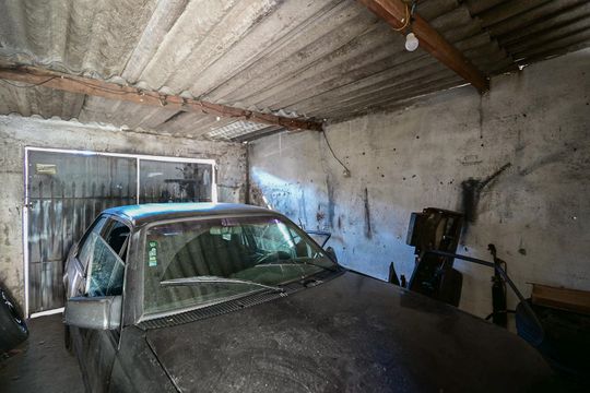Garagem da Casa 3 de casa à venda com 6 quartos, 250m² em Parque Arariba, São Paulo