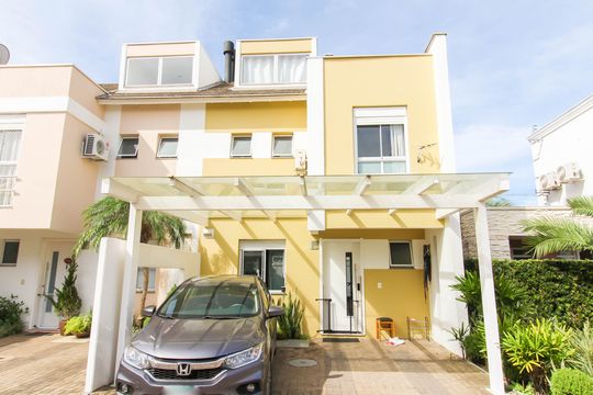 Fachada de casa de condomínio para alugar com 4 quartos, 252m² em Estância Velha, Canoas