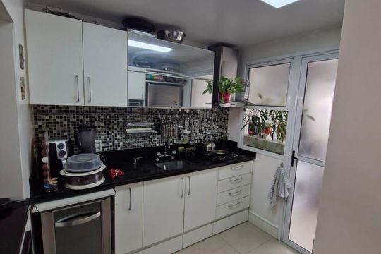 Cozinha de casa de condomínio à venda com 3 quartos, 146m² em Sarandi, Porto Alegre