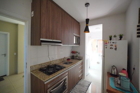 Cozinha de apartamento para alugar com 2 quartos, 66m² em Santinho, Florianópolis