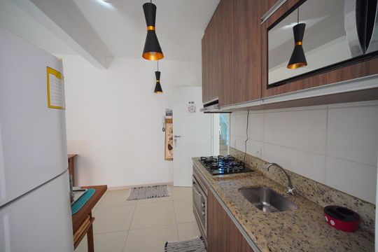 Cozinha de apartamento para alugar com 2 quartos, 66m² em Santinho, Florianópolis