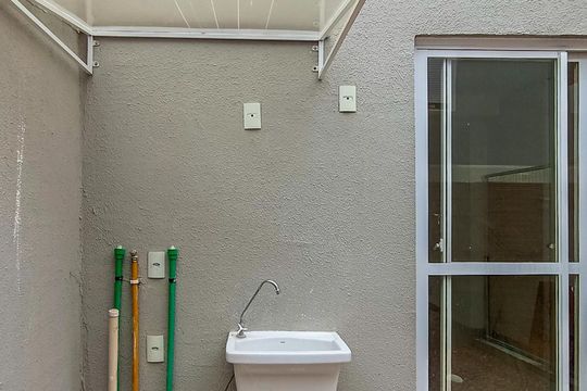 Área de Serviço de casa de condomínio à venda com 2 quartos, 60m² em Vila Nova, Porto Alegre