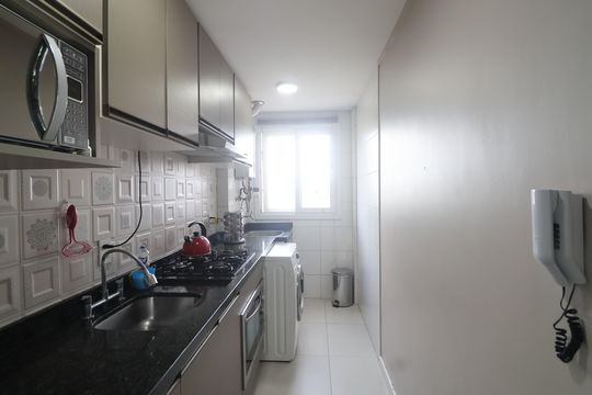 Cozinha e Área de Serviço de apartamento à venda com 2 quartos, 60m² em Niterói, Canoas