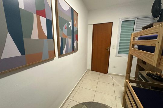 Sala 1 de apartamento para alugar com 2 quartos, 59m² em Vila Voturuá, São Vicente