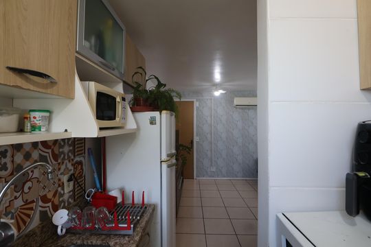 Cozinha e Área de Serviço de apartamento para alugar com 2 quartos, 47m² em Mato Grande, Canoas