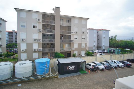 Sala - Vista de apartamento à venda com 2 quartos, 49m² em Humaitá, Porto Alegre