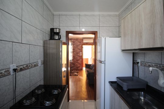 Cozinha de apartamento à venda com 2 quartos, 59m² em Rubem Berta, Porto Alegre