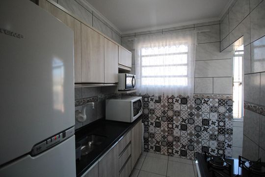 Cozinha de apartamento à venda com 2 quartos, 59m² em Rubem Berta, Porto Alegre