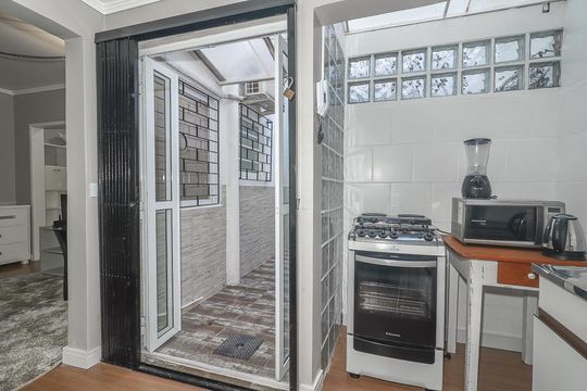 Cozinha de apartamento à venda com 1 quarto, 45m² em Bela Vista, Porto Alegre