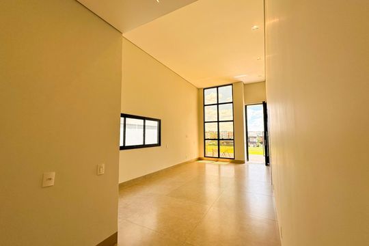 Sala de casa de condomínio para alugar com 4 quartos, 212m² em Gávea, Uberlândia