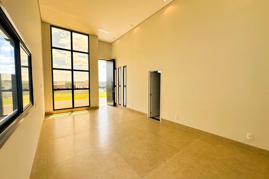 Sala de casa de condomínio para alugar com 4 quartos, 212m² em Gávea, Uberlândia