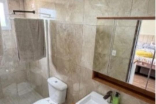 Banheiro 1 de casa de condomínio à venda com 3 quartos, 50m² em Hípica, Porto Alegre