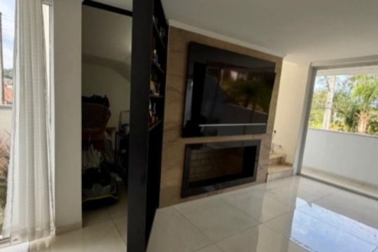 Sala de casa de condomínio à venda com 3 quartos, 50m² em Hípica, Porto Alegre